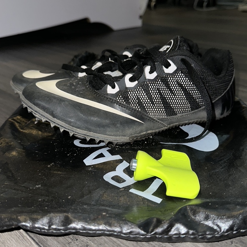 Nike Women’s ZoomRival S Track Racing shoe Black with spikes and spike screw